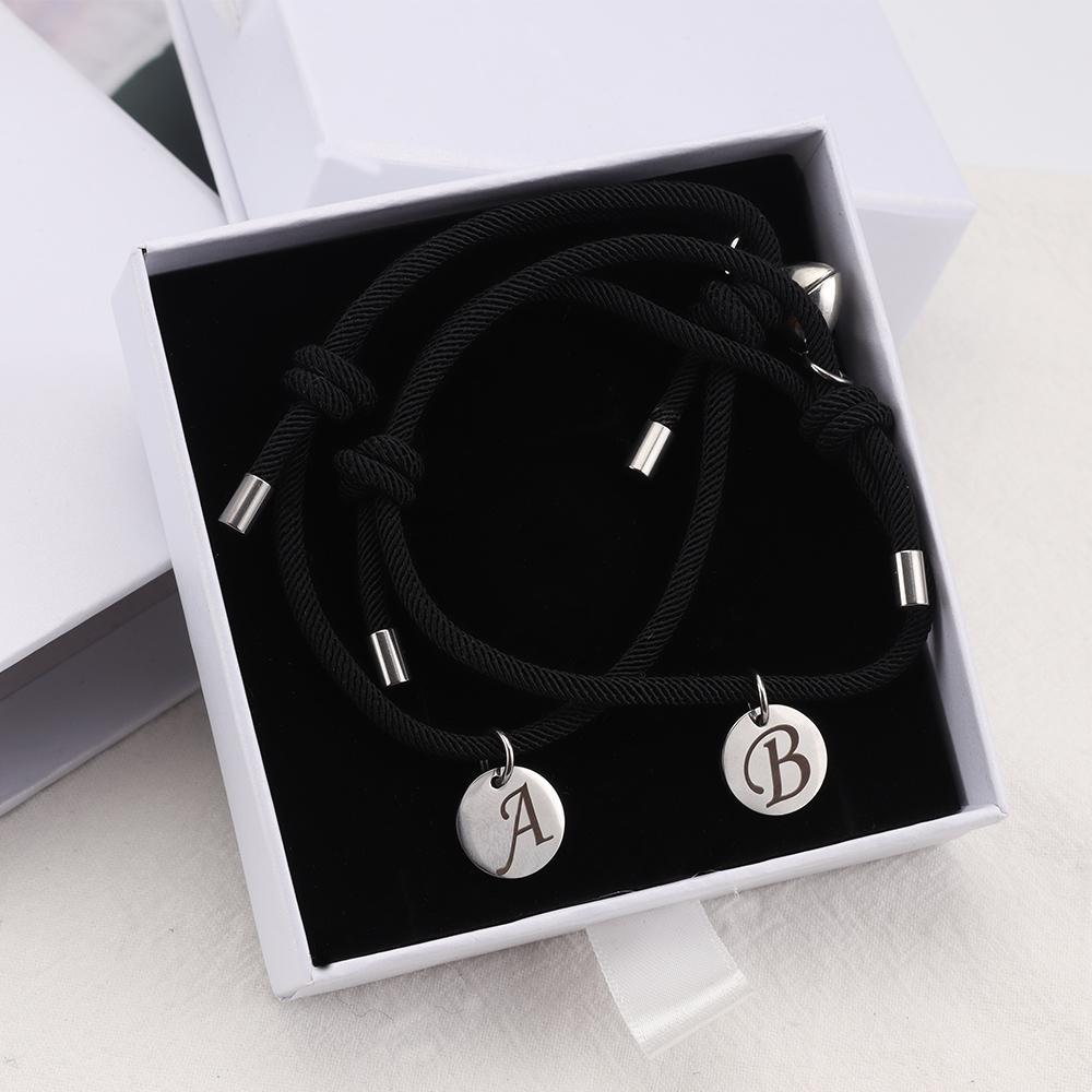 Coppia di braccialetti con lettera d'amore