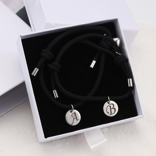 Coppia di braccialetti con lettera d'amore